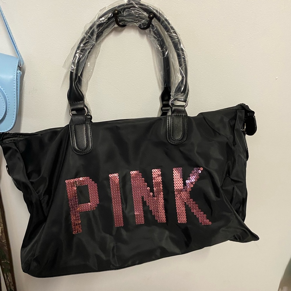 Pink duffel bag